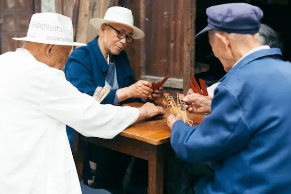 A picture of people playing traditional Chinese board games