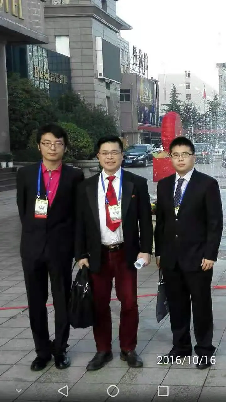 Diagram 7 Wang Ge with IGM Romeo Xue and IGM Pu Fangyao (far left). All three have are important promoters of Xiangqi.